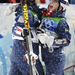 Olympic moguls champion Hannah Kearney of team USA, left, is congratulated by third-place Shannon Bahrke of team USA at the Vancouver 2010 Olympics on Saturday.