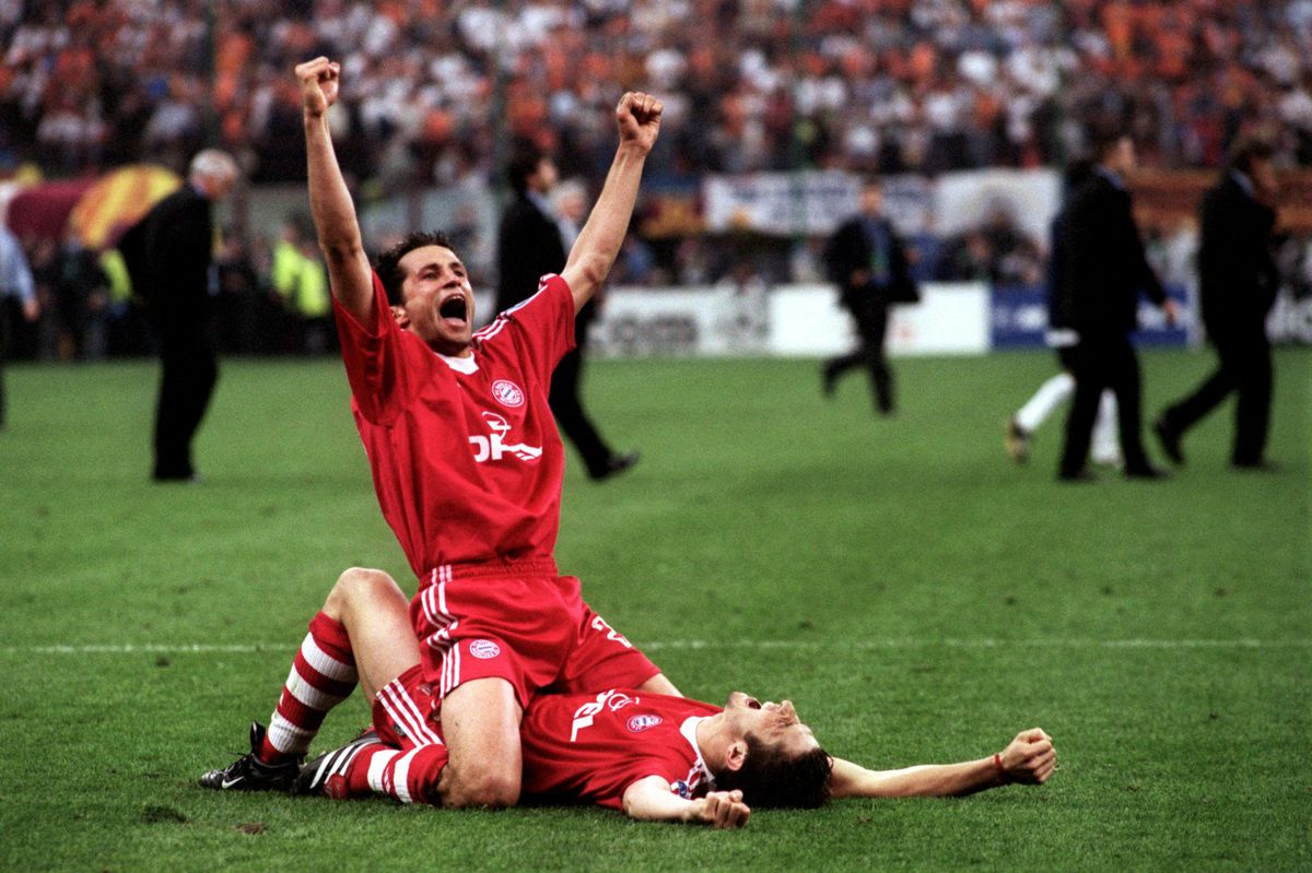 Bayern Munich's Hasan Salihamidzic (top) and Bixente Lizarazu (on floor) celebrate winning the UEFA Champions League final.
