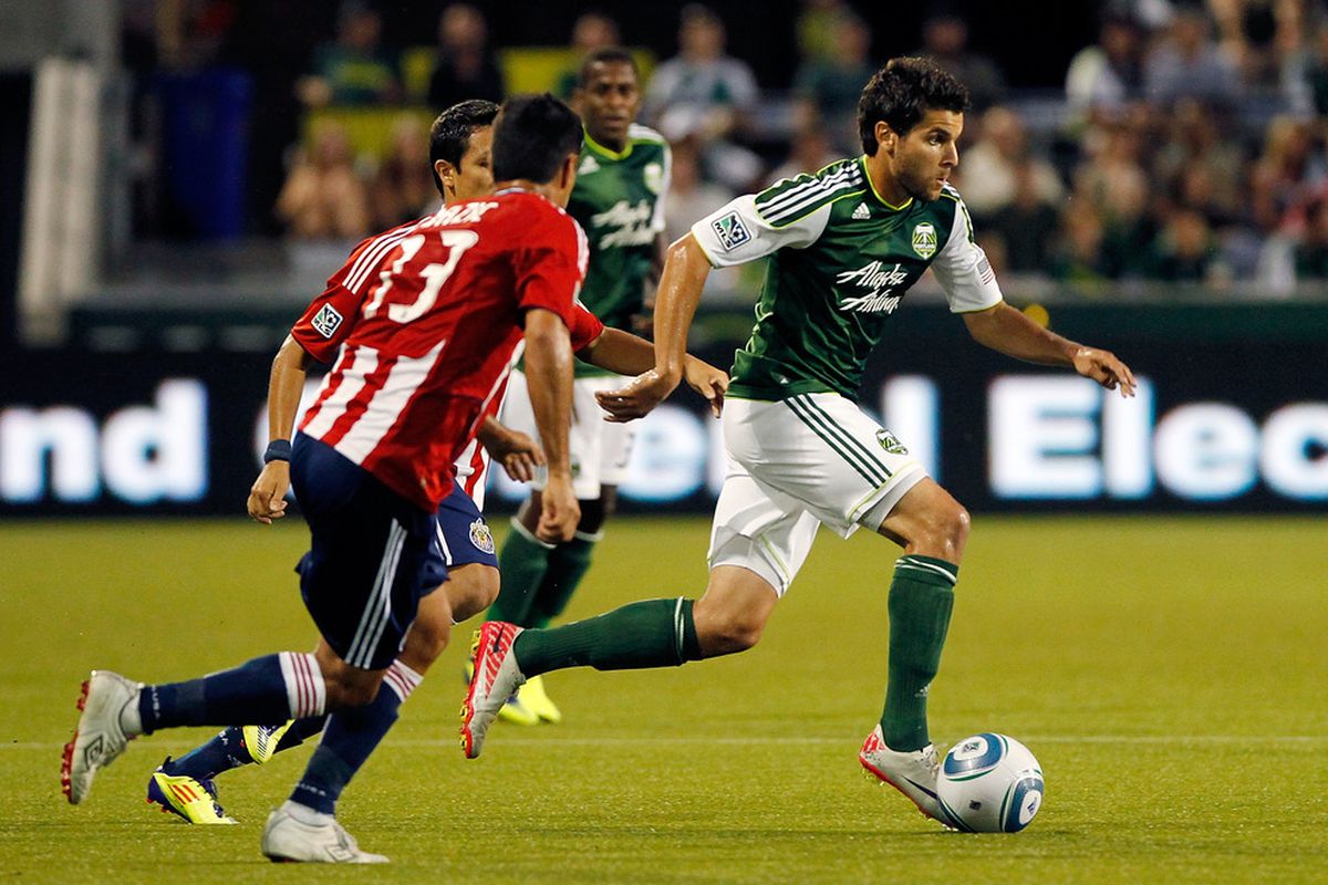 PORTLAND, OR - AUGUST 24:  Sal Zizzo #7 of the Portland Timbers battles against Ante Jazic #13 of  Chivas USA  on August 24, 2011 at Jeld-Wen Field in Portland, Oregon.  (Photo by Jonathan Ferrey/Getty Images)