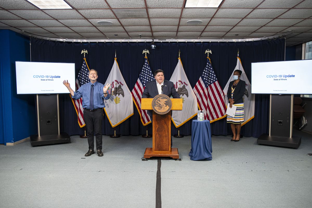 Gov. J.B. Pritzker answers questions from the media during a daily COVID-19 update at the James R. Thompson Center earlier this month.