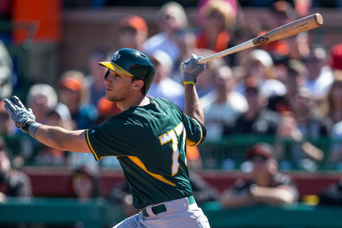 Matt Olson bats for the A's in 2015 spring training. He is Oakland's #2 prospect at MLB.com, behind Franklin Barreto.