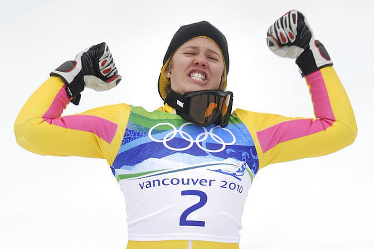 Germany's Viktoria Rebensburg reacts during the flower ceremony for Women's giant slalom after she surprisingly won a gold medal in the event.