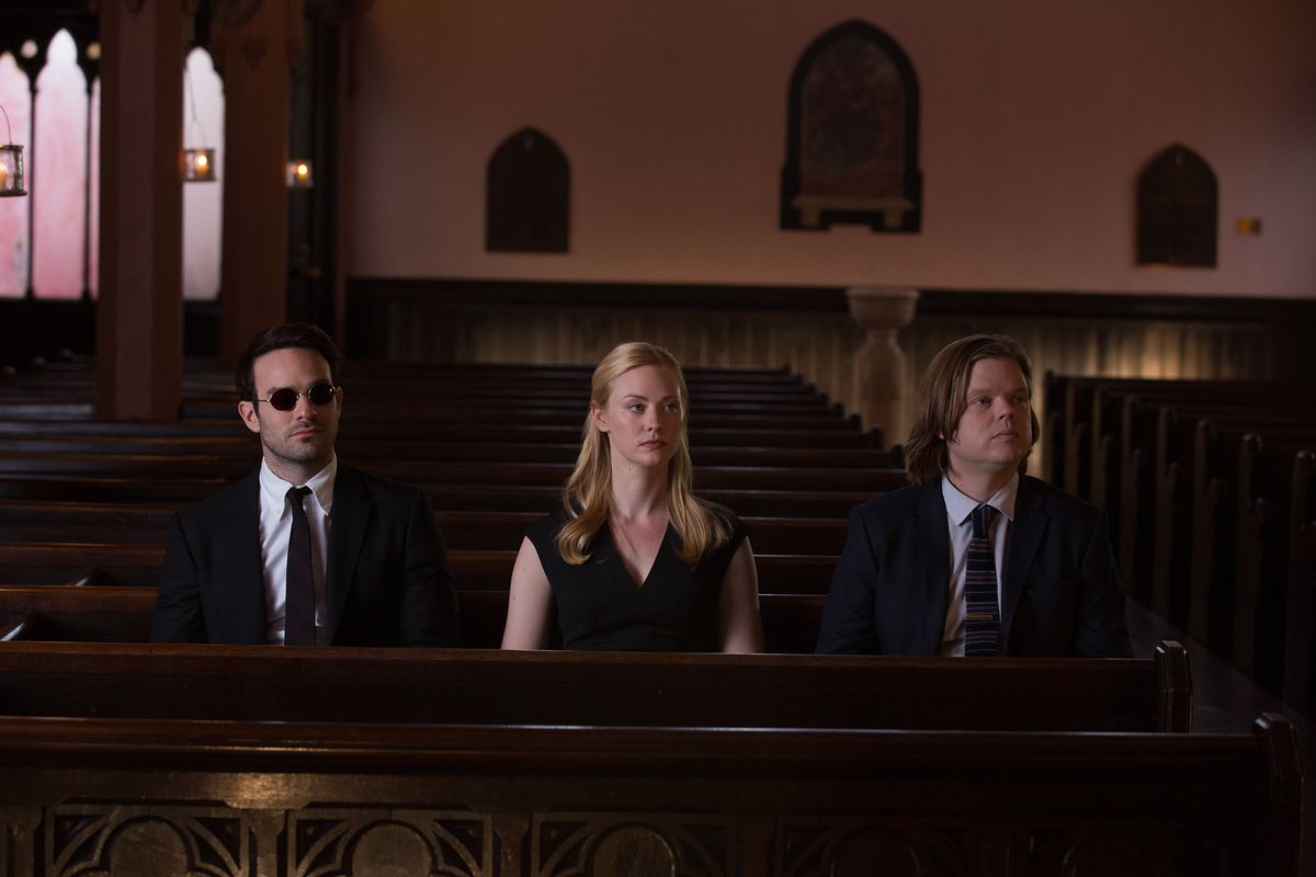Matt Murdock, Karen Page and Foggy Nelson attend a funeral in the second season of Daredevil.