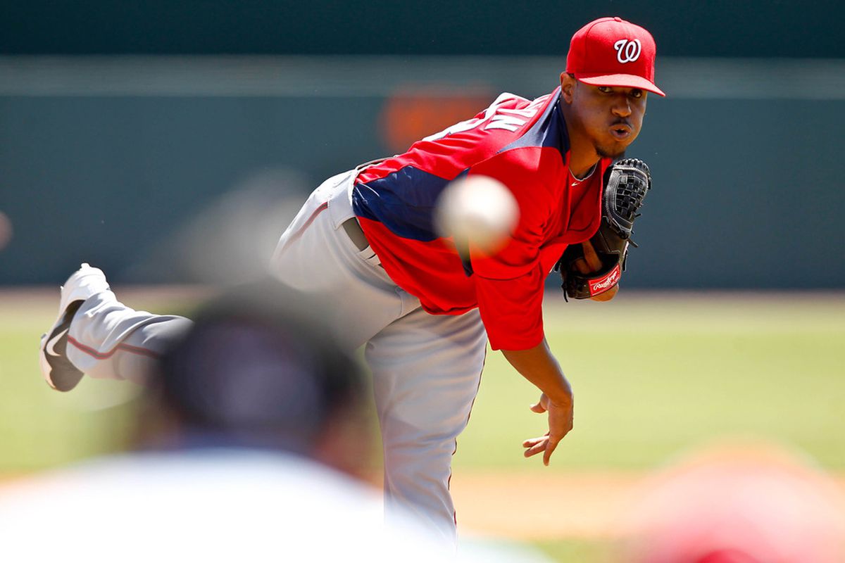 March 24, 2012; Sarasota, FL, USA; Washington Nationals pitcher Edwin Jackson throws during the bottom of the first inning of a spring training game against the Baltimore Orioles at Ed Smith Stadium.  Mandatory Credit: Derick E. Hingle-US PRESSWIRE