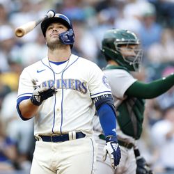 Ty France #23 of the Seattle Mariners reacts after striking out during the eighth inning against the Oakland Athletics
