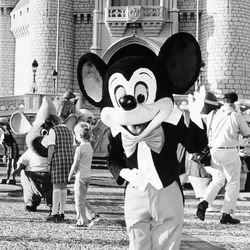 Mickey Mouse welcomes construction workers and their families to Disney World in Orlando, Florida, Sept. 30, 1971 during weekend dry run for the opening of the amusement park, located 20 miles southwest of Orlando on Friday. 