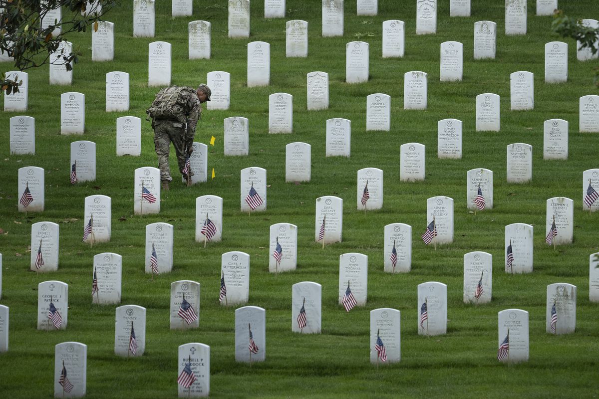 Arlington Cemetery Hosts Annual Flags-In Ceremony Ahead Of Memorial Day Weekend