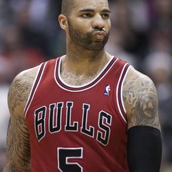 Chicago's Carlos Boozer walks up court after being hit with at technical foul as the Jazz and the Bulls play Friday, Feb. 8, 2013 at Energy Solutions arena. Chicago won 93-89.