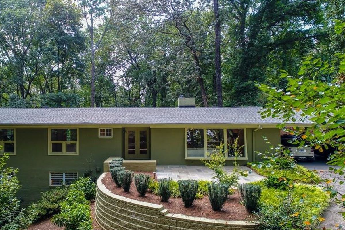 A renovated midcentury modern residence in buckhead for sale right now at $795,000. 