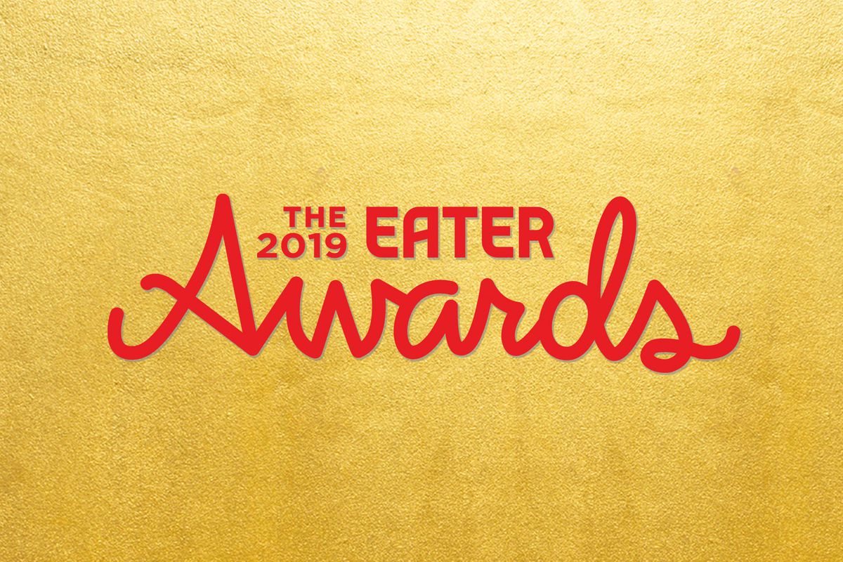 A gold background with red writing reading The 2019 Eater Awards.