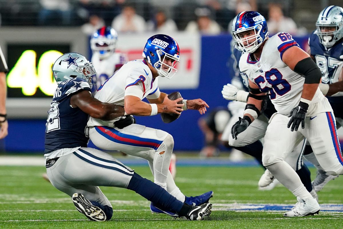 Dallas Cowboys defensive end Dorance Armstrong (92) sacks New York Giants quarterback Daniel Jones (8) in the second half. The Giants fall to the Cowboys, 23-16, at MetLife Stadium