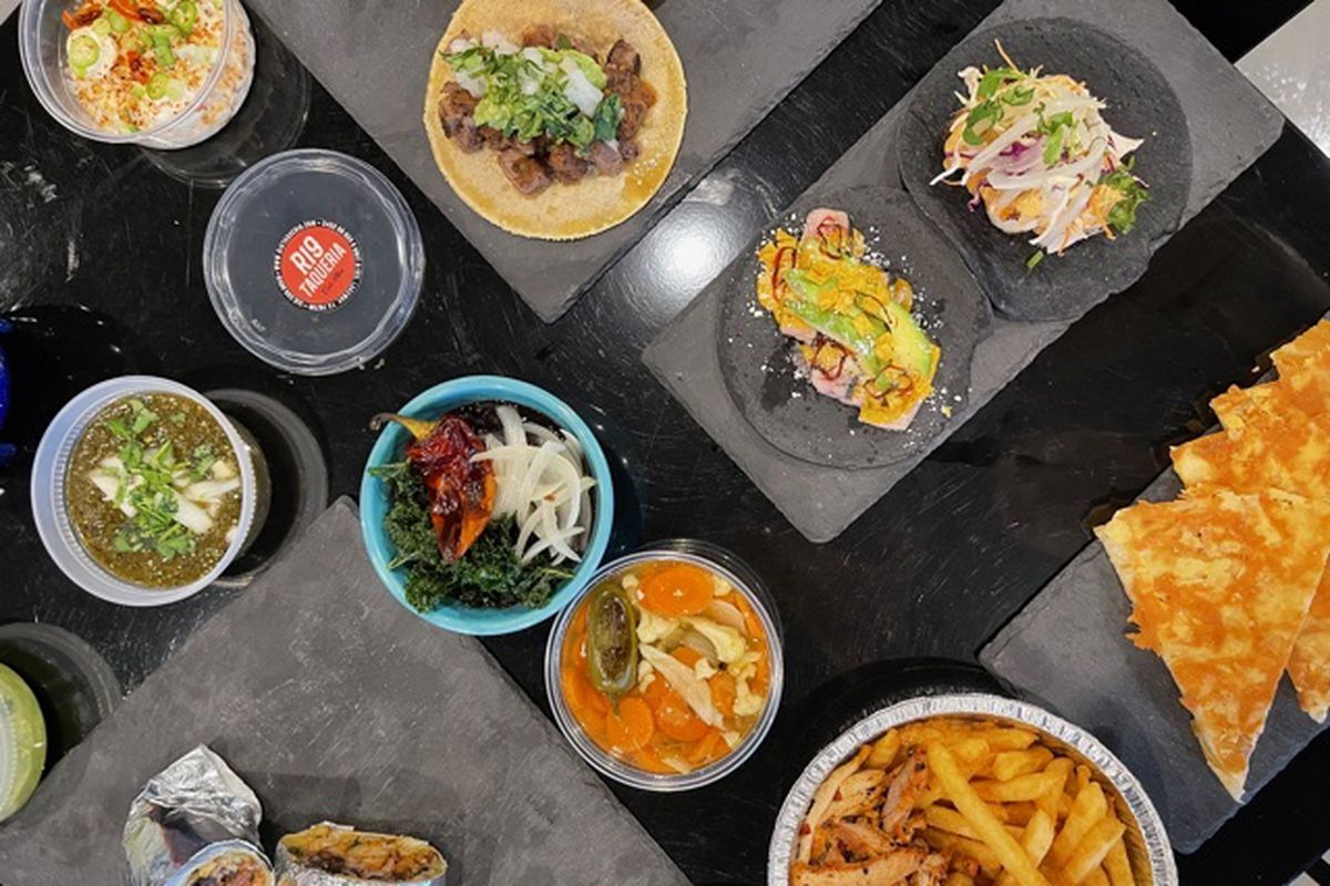 An array of Mexican dishes on a table.