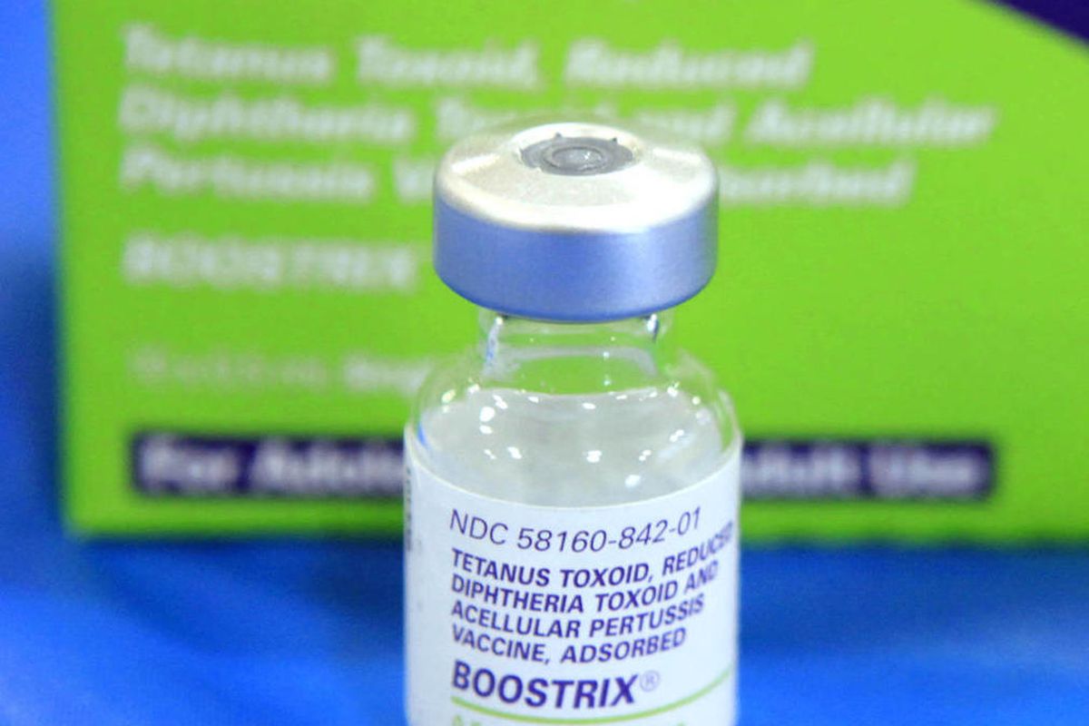An empty bottle of Tetanus, Diphthera and Pertussis, (whooping cough) vaccine is seen at Inderkum High School in Sacramento. Calif. 