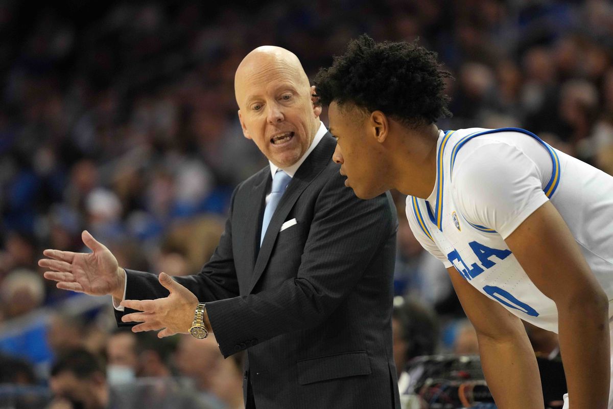 UCLA Bruins head coach Mick Cronin talks with guard Jaylen Clark against the Colorado Buffaloes in the second half at Pauley Pavilion.