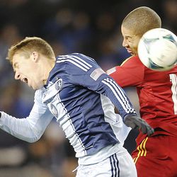 Kansas City's Matt Besler and Real's Alvaro Saborio head the ball as Real Salt Lake and Sporting KC play Saturday, Dec. 7, 2013 in MLS Cup action. Sporting KC won in a shootout.