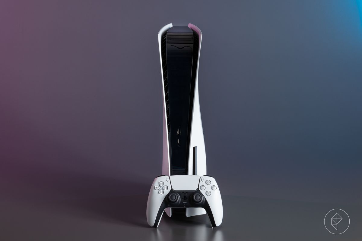 A DualSense controller in front of a PS5 console