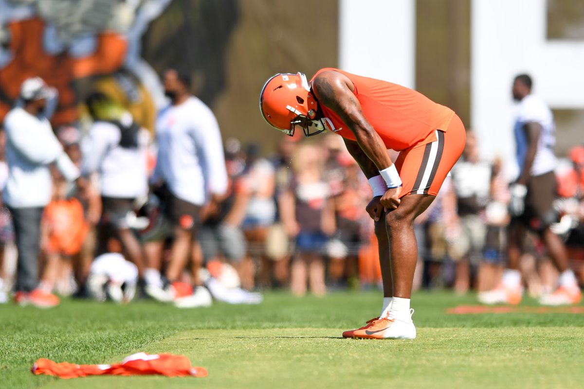 Deshaun Watson #4 of the Cleveland Browns rests after running a drill during Cleveland Browns training camp at CrossCountry Mortgage Campus on July 30, 2022 in Berea, Ohio.