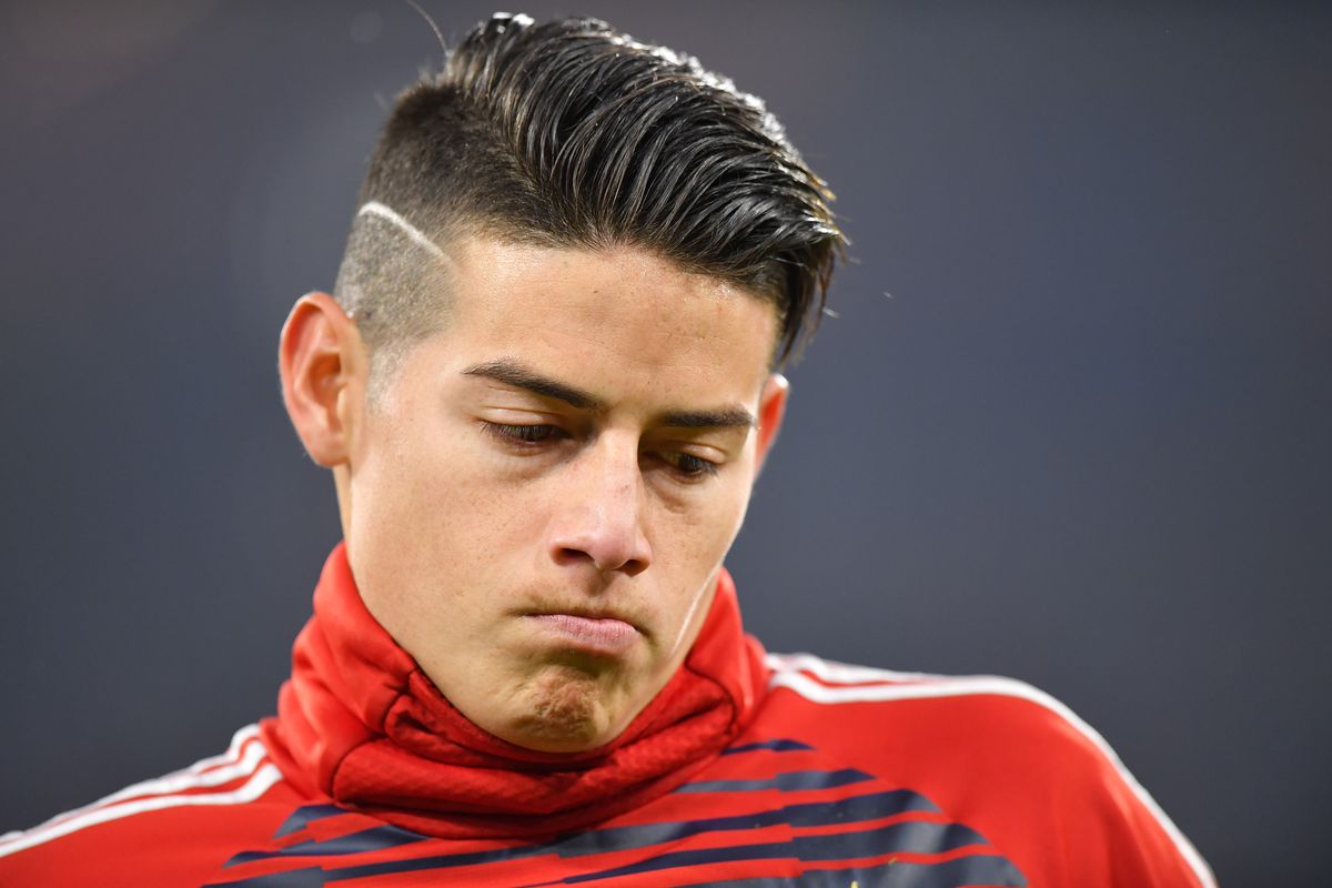 James Rodriguez of Bayern Muenchen looks down prior to the Bundesliga match between FC Bayern Muenchen and FC Schalke 04 at Allianz Arena on February 10, 2018 in Munich, Germany.