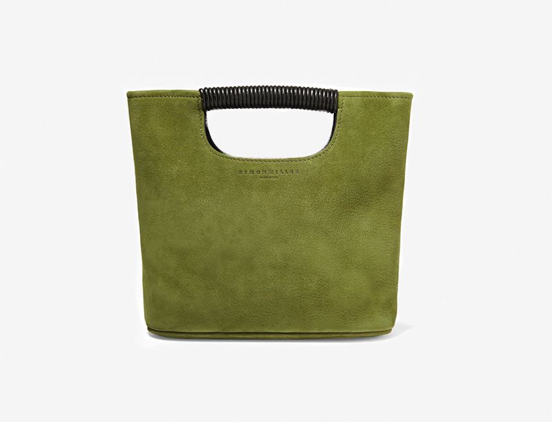 Green suede top handle bag.