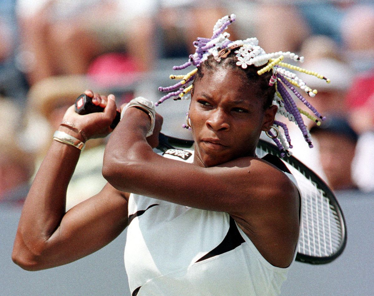 Serena Williams with her styled into braids with beads.