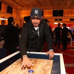 Deejay Alesso plays shuffleboard at Encore Players Club.