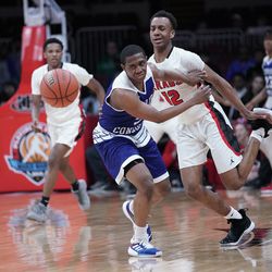 Rockford East’s Sha’Den Clanton (12) punches the ball away from Curie’s Trevon Hamilton (5) in the 4A 3rd place game at Peoria Civic Center in Peoria IL, Saturday 03-16-19. Worsom Robinson/For the Sun-Times