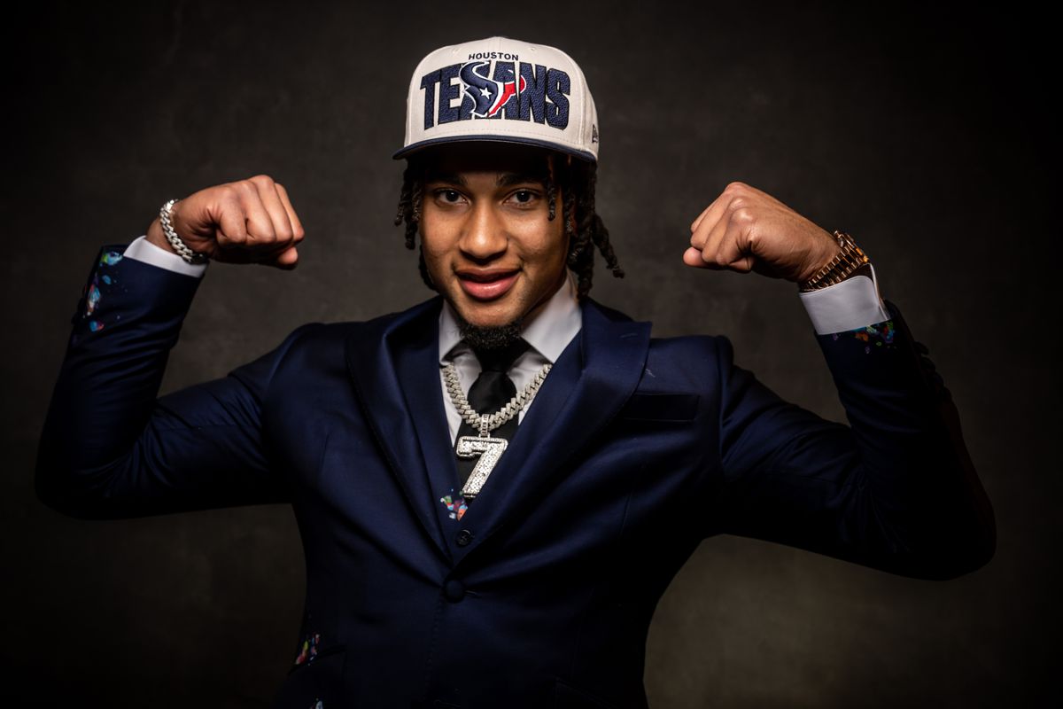CJ Stroud poses after being selected second overall pick by the Houston Texans during the first round of the 2023 NFL Draft at Union Station on April 27, 2023 in Kansas City, Missouri.