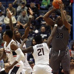 UConn's Mamadou Diarra (21) & Terry Larrier (22) during the Monmouth Hawks vs UConn Huskies men's college basketball game at the XL Center in Hartford, CT on December 2, 2017.