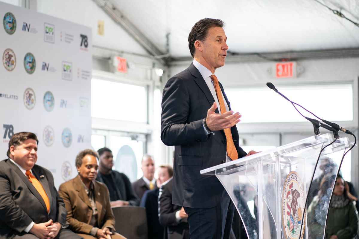 Curt Bailey, president of Related Midwest, speaks at a February 2020 event announcing the University of Illinois investment in the South Loop site known as The 78. Gov. J.B. Pritzker and Mayor Lori Lightfoot look on.