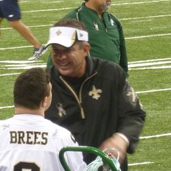 Payton greets a fan before the game. 
