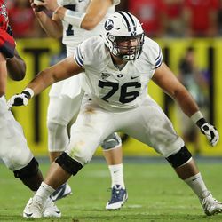 Brigham Young Cougars offensive lineman Keyan Norman (76) blocks in Phoenix on Saturday, Sept. 3, 2016. BYU leads 9-0 at half.