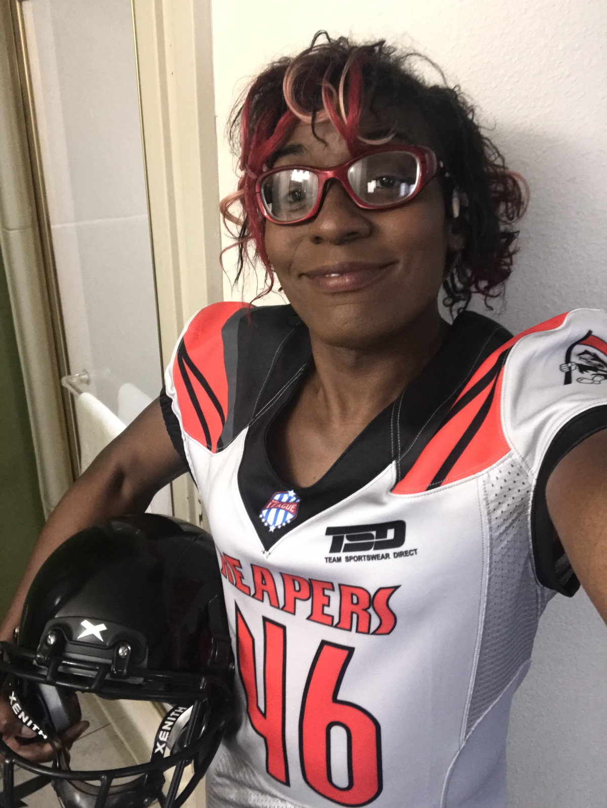  A women’s football player in her uniform.