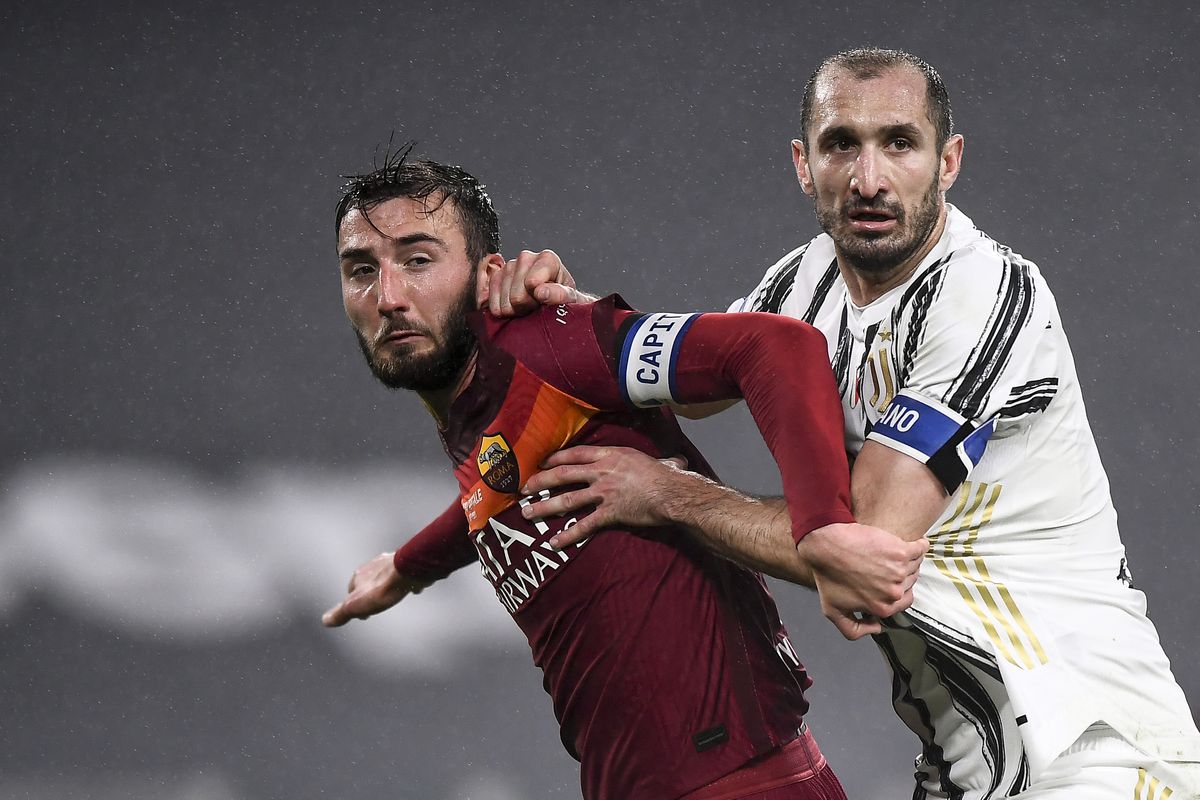 Bryan Cristante (L) of AS Roma competes with Giorgio...