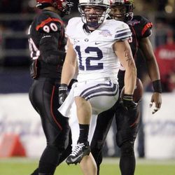 Brigham Young Cougars wide receiver JD Falslev (12) celebrates his long run during the Poinsettia Bowl in San Diego Thursday, Dec. 20, 2012. BYU beat San Diego 23-6.