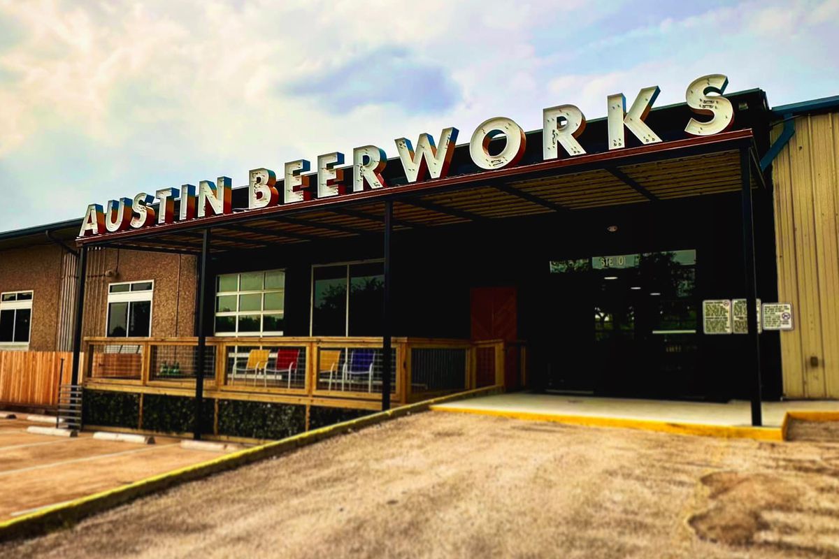 A brewery facade with a sign reading “Austin Beerworks.”