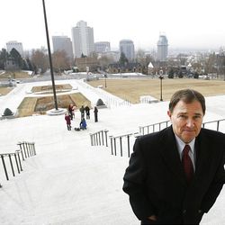 Gov. Gary Herbert walks back into the Capitol after he and mayors from across the Wasatch Front announced efforts to improve air quality across the state at a press conference on the south steps of the Utah State Capitol on Friday, Jan. 29.
