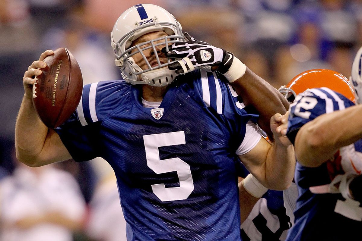 INDIANAPOLIS, IN - SEPTEMBER 18:  Kerry Collins #5 of the Indianapolis Colts is sacked by Artis Hicks #75 of the Cleveland Browns  at Lucas Oil Stadium on September 18, 2011 in Indianapolis, Indiana.  (Photo by Matthew Stockman/Getty Images)