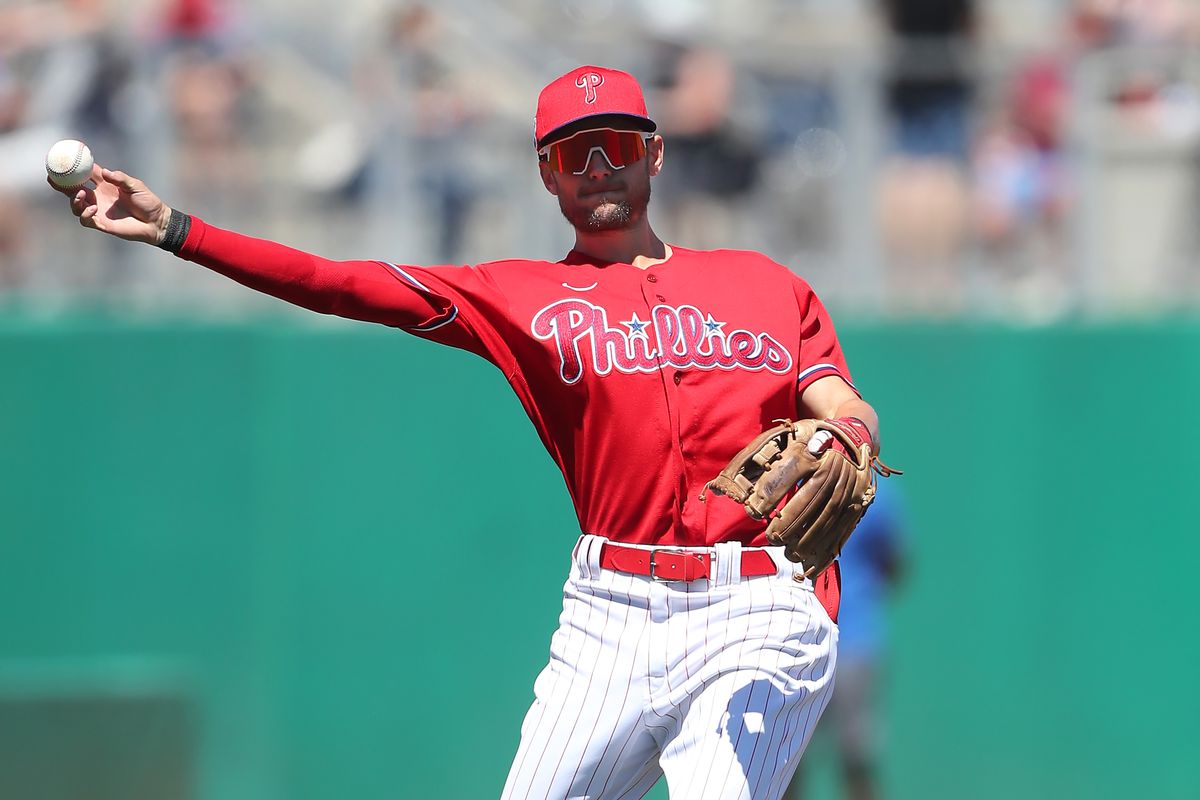 Philadelphia Phillies Shortstop Trea Turner (7) throws the ball over to first base during the spring training game between the Toronto Blue Jays and the Detroit Tigers on March 23, 2023 at BayCare Ballpark in Clearwater, Florida.