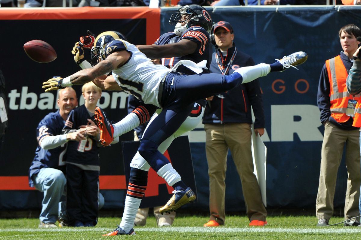 Sep 23, 2012; Chicago, IL, USA; St. Louis Rams cornerback Cortland Finnegan (31) breaks up a pass intended for Chicago Bears wide receiver Alshon Jeffery (17) during the first quarter at Soldier Field.  Mandatory Credit: Rob Grabowski-US PRESSWIRE
