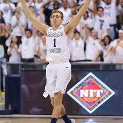Brigham Young Cougars guard Chase Fischer (1) celebrates a three point shot as BYU and Creighton play in NIT quarterfinal action at the Marriott Center in Provo Tuesday, March 22, 2016.