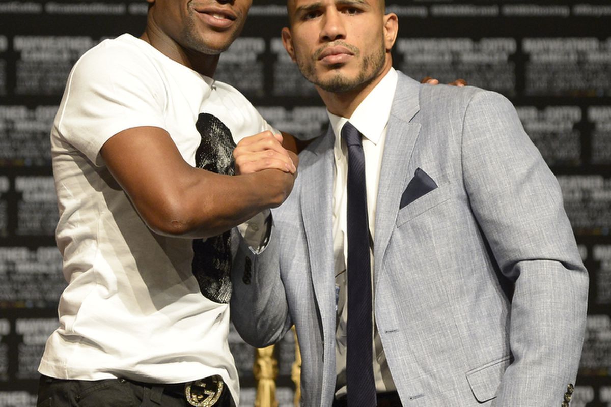 There has been no animosity between Floyd Mayweather and Miguel Cotto in the buildup to Saturday night's fight. (Photo by Gene Blevins/Hoganphotos-Golden Boy Promotions)