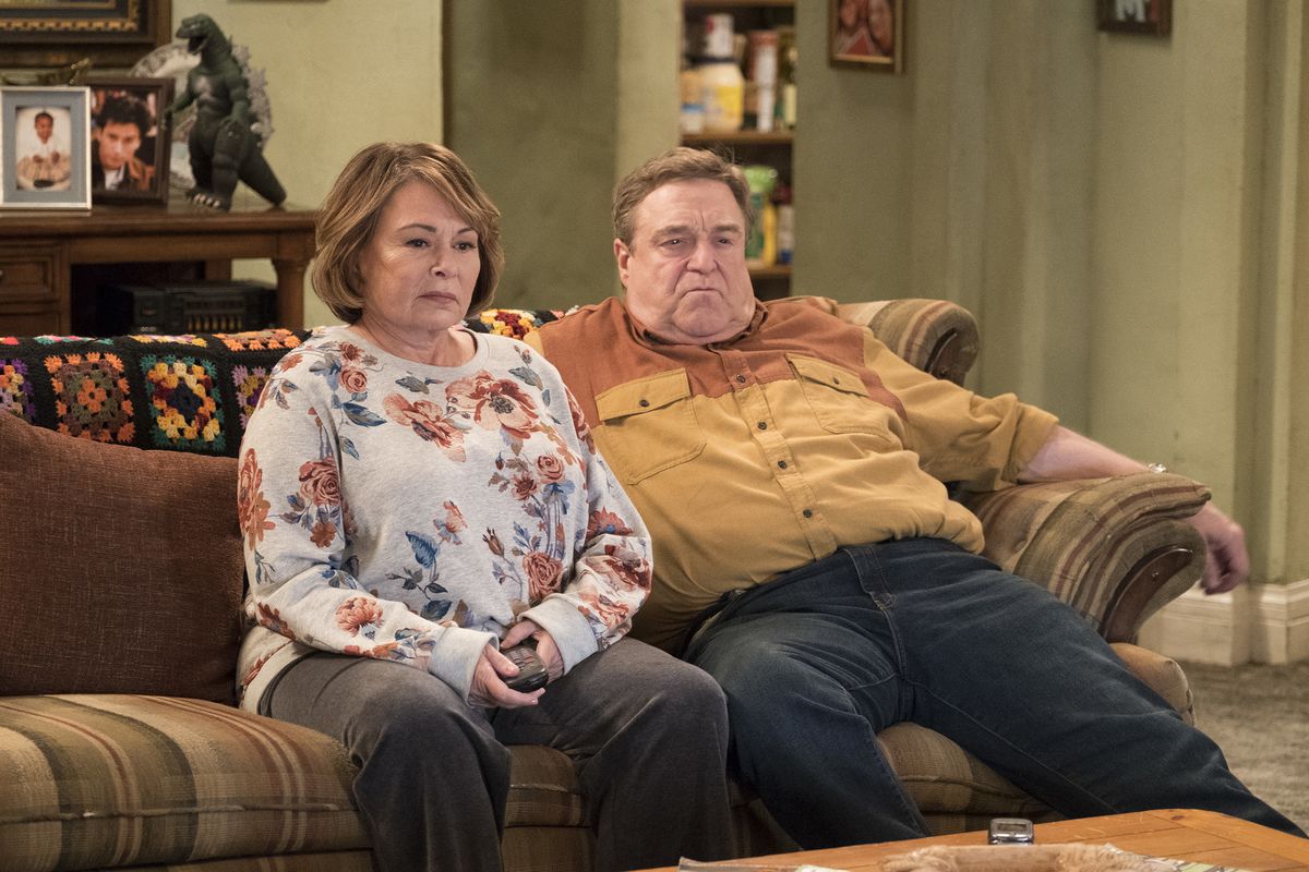In this image released by ABC, Roseanne Barr, left, and John Goodman appear in a scene from the reboot of "Roseanne," premiering on Tuesday at 8 p.m. EST. (Adam Rose/ABC via AP)
