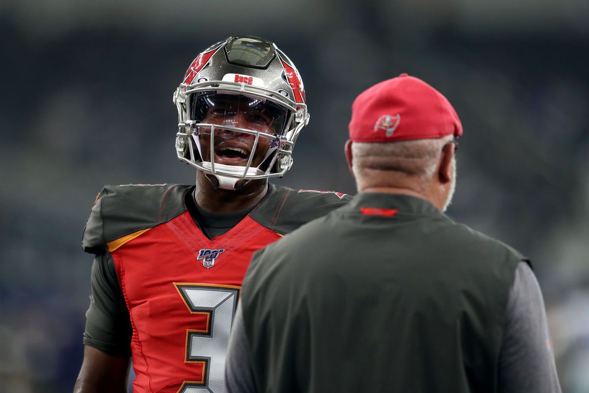 Tampa Bay Buccaneers quarterback Jameis Winston talks with head coach Bruce Arians before a NFL preseason game at AT&amp;T Stadium on August 29, 2019 in Arlington, Texas.
