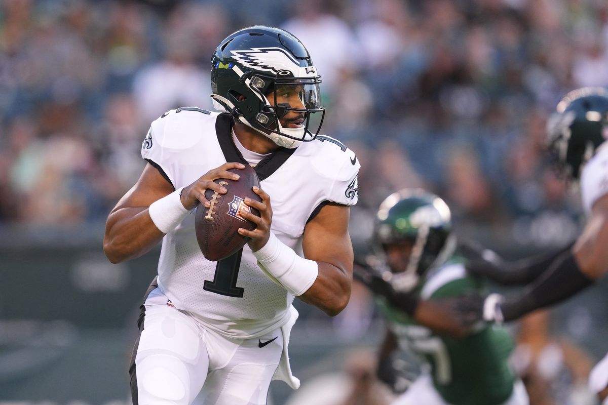 Jalen Hurts #1 of the Philadelphia Eagles scrambles against the New York Jets in the first half of the preseason game at Lincoln Financial Field on August 12, 2022 in Philadelphia, Pennsylvania.