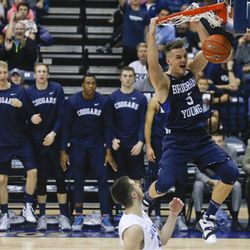 BYU guard Kyle Collinsworth slams home a basket against San Diego during the second half of an NCAA college basketball game won by BYU 69-67 Thursday, Feb. 18, 2016, in San Diego.  (AP Photo/Lenny Ignelzi)