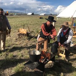 This trio of men will greet the throng of visitors expected for the Friday celebration of the 150th anniversary of the wedding of the wells at Promontory Summit in Utah. Pictured left to right are living history actors Mike Chatelain, Tyrel Phister, the son of Alan Phister who is seated.