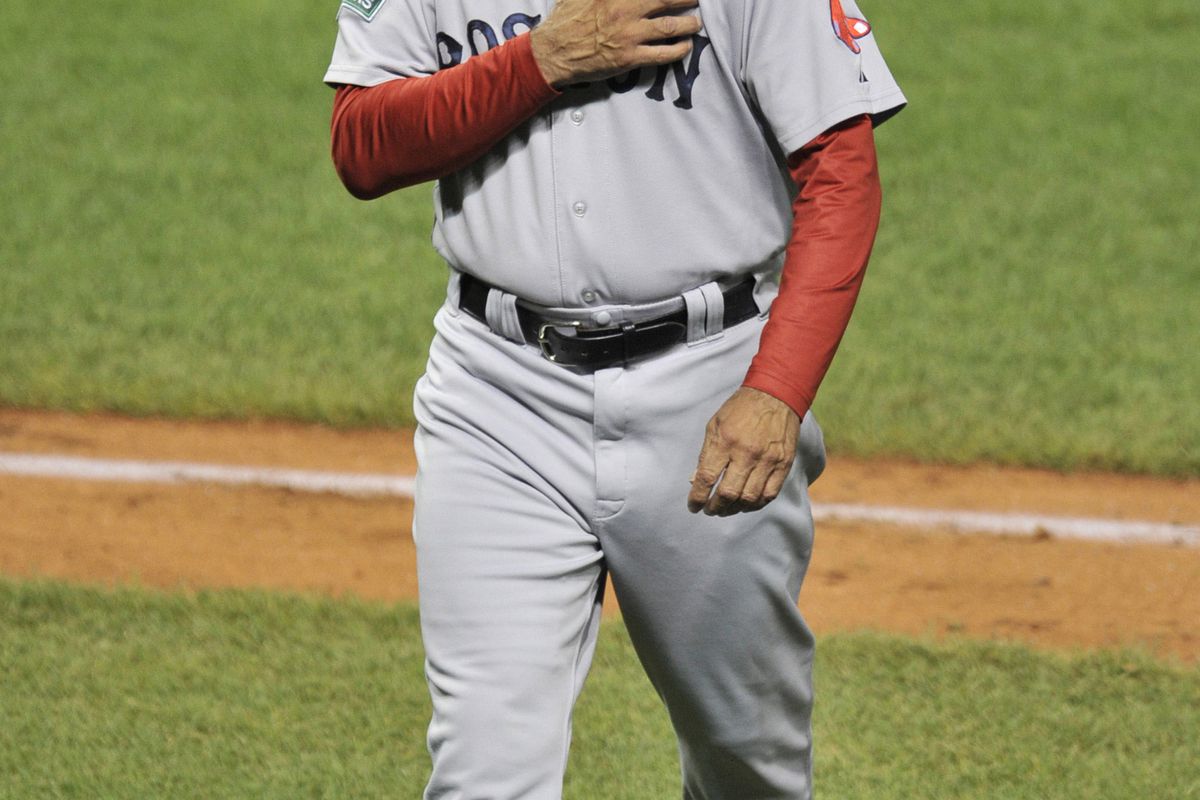 Aug 9, 2012; Cleveland, OH, USA; Boston Red Sox manager Bobby Valentine (25) walks back to the dugout after a pitching change in the fifth inning against the Cleveland Indians at Progressive Field. Mandatory Credit: David Richard-US PRESSWIRE