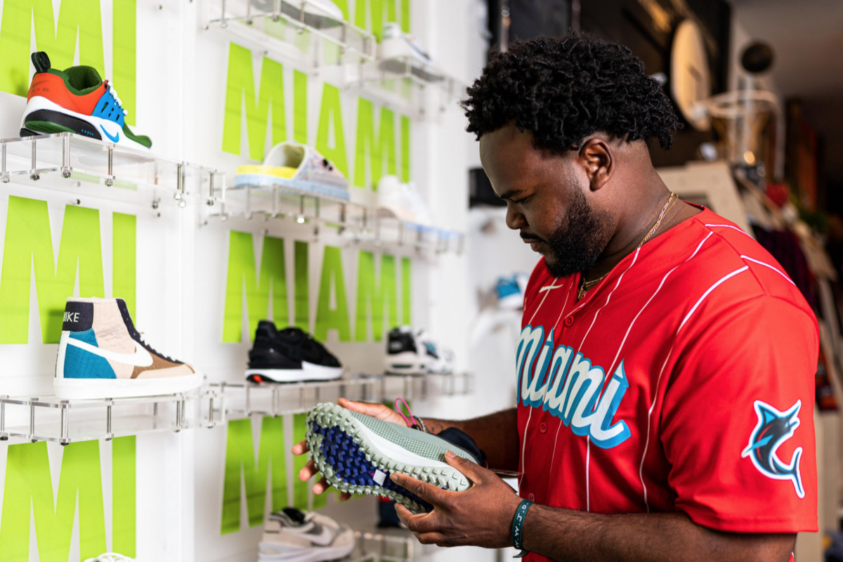 Miami-based film director Kenzy Isnady examines a sneaker collection