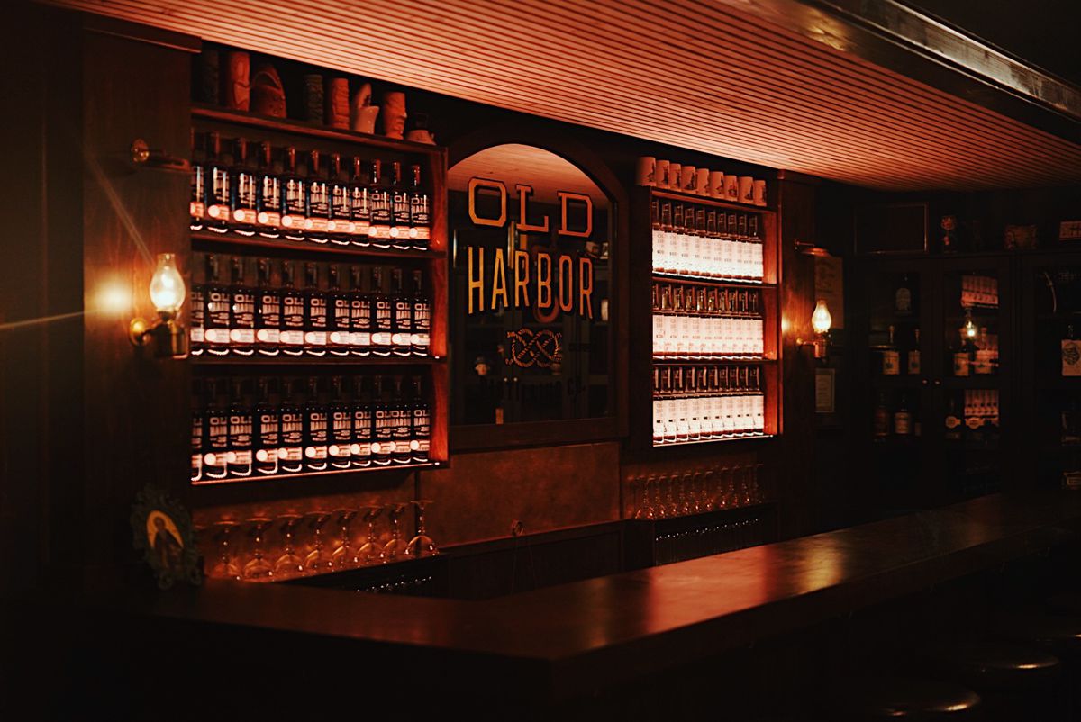 A wooden bar inside a speakeasy.