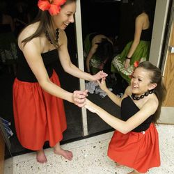BYU student Kelsey Morasco and friend  Ashley Mauger celebrate after their BYU Luau 20212 dance in Provo  Mar 27, 2012. 